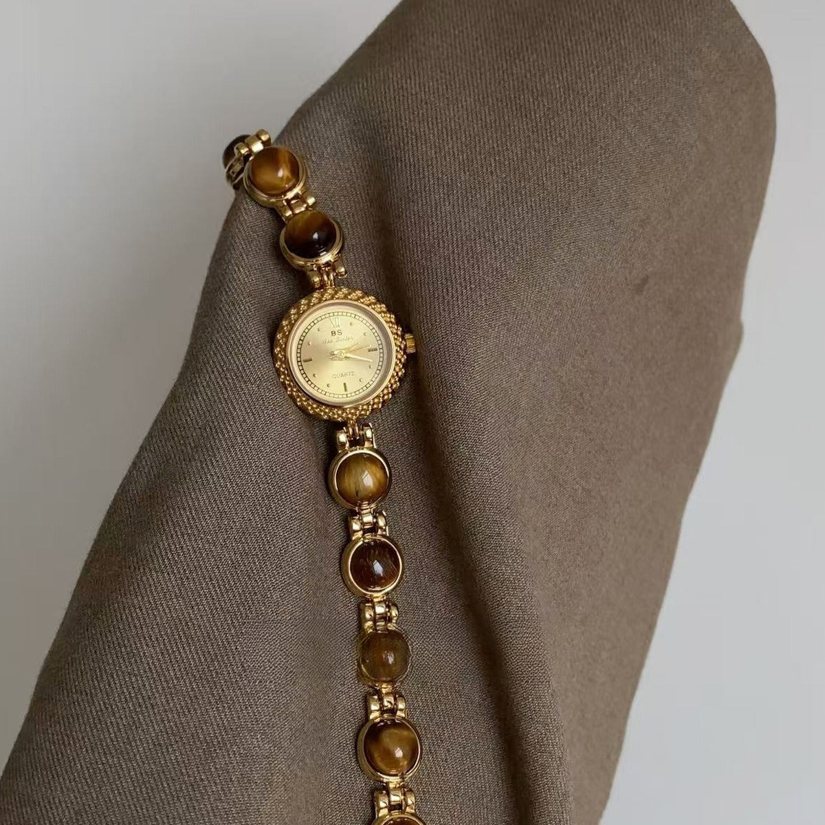 Vintage-inspired, niche, high-end, and subtly luxurious tiger's eye bracelet watch - new design