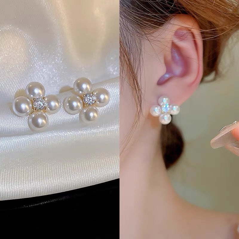 Earrings: luxurious and sophisticated 925 sterling silver stud earrings with pearls. elegant and versatile, a timeless classic
