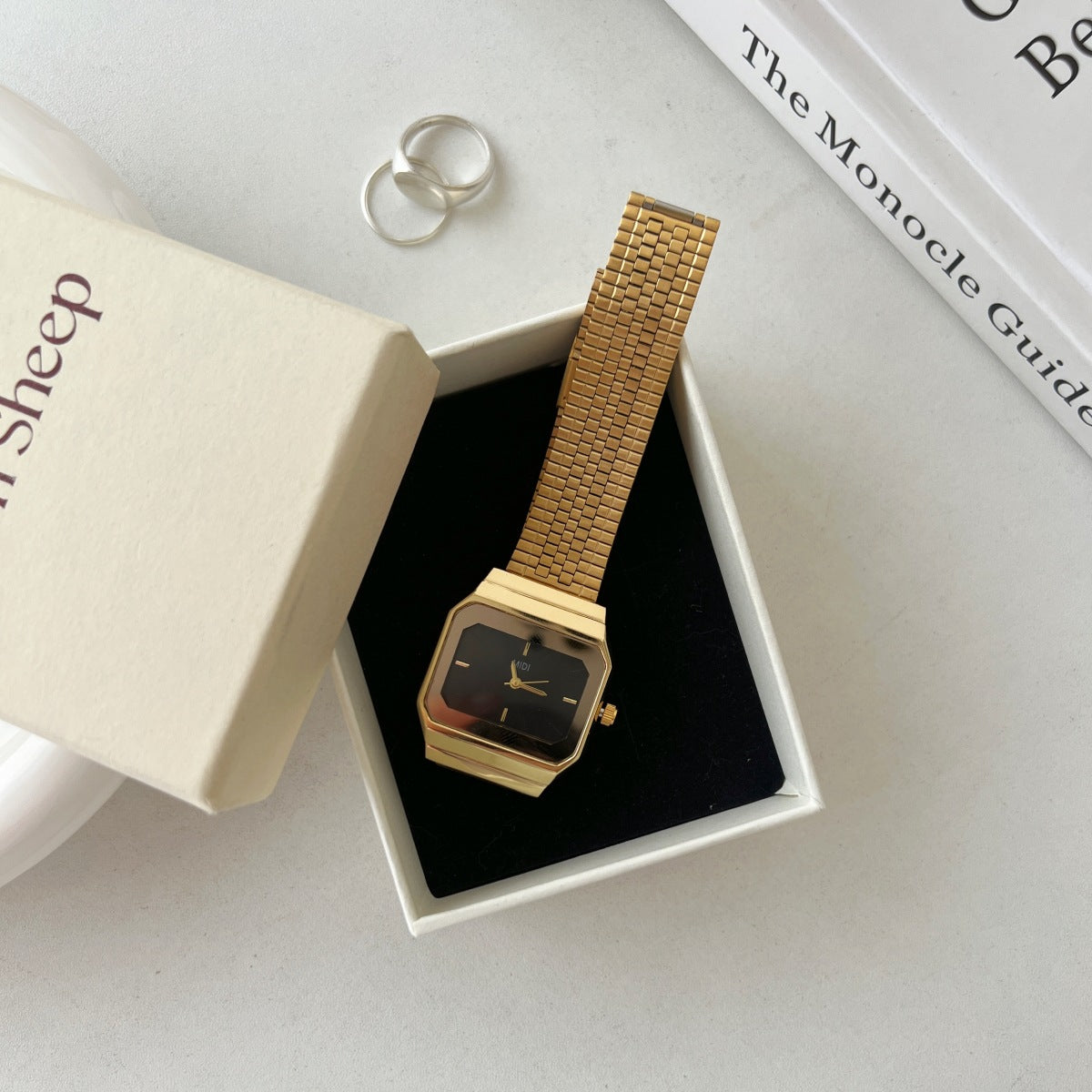 Gold-tone square watch for women - vintage-inspired, understated luxury, exquisite minimalist design
