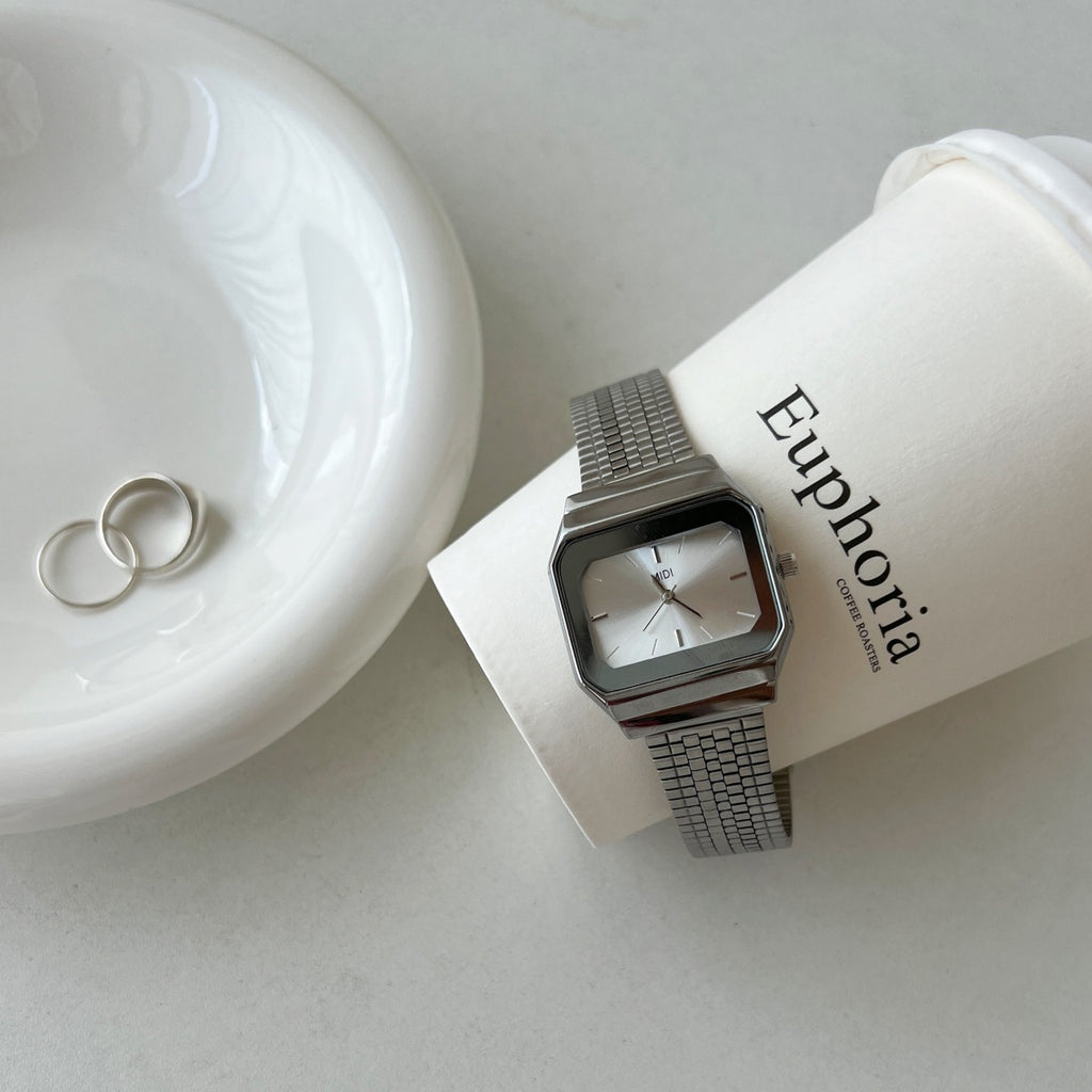 Gold-tone square watch for women - vintage-inspired, understated luxury, exquisite minimalist design