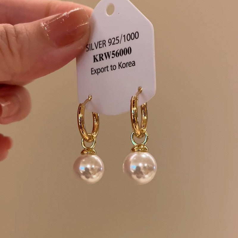 Earrings: luxurious and sophisticated 925 sterling silver stud earrings with pearls. elegant and versatile, a timeless classic