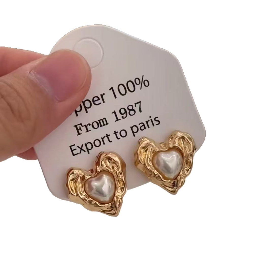 Earrings: luxurious and sophisticated 925 sterling silver stud earrings with pearls. elegant and versatile, a timeless classic