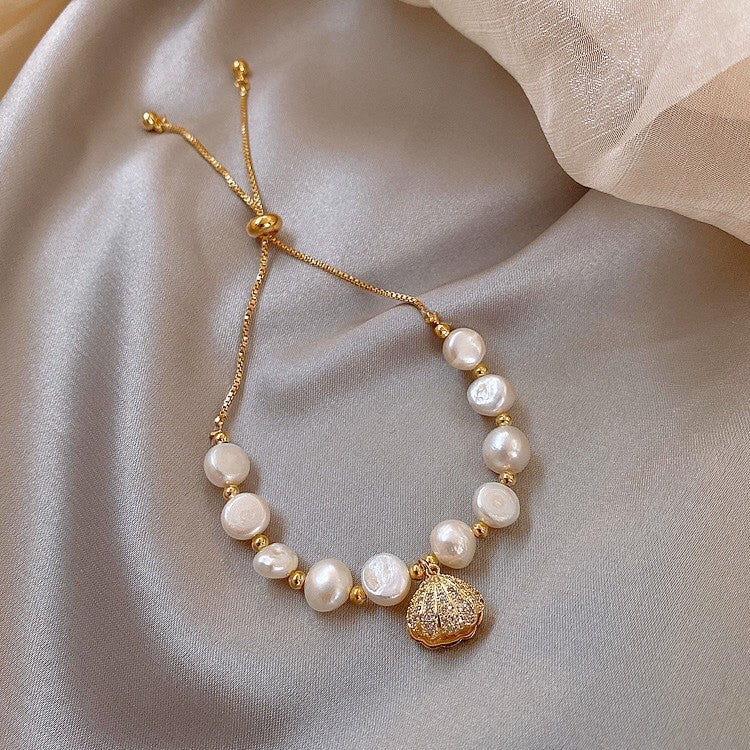 French retro zircon starburst pearl bracelet - exquisite, elegant, versatile, and luxurious for women