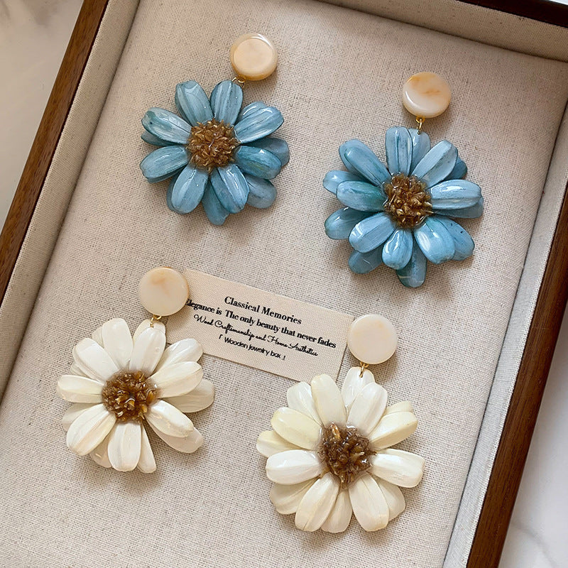 Daisy-inspired beach vacation earrings: unique, beautiful, high-end, and luxe