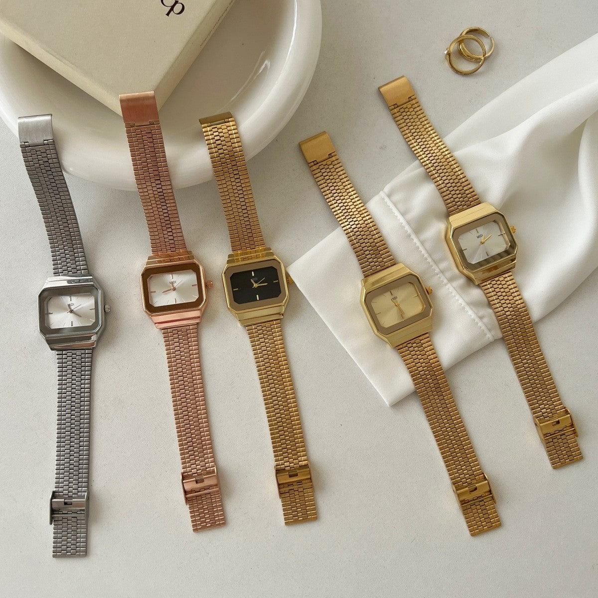 Gold-tone square watch for women - vintage-inspired, understated luxury, exquisite minimalist design