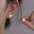 Earrings: luxurious and sophisticated 925 sterling silver stud earrings with pearls. elegant and versatile, a timeless classic