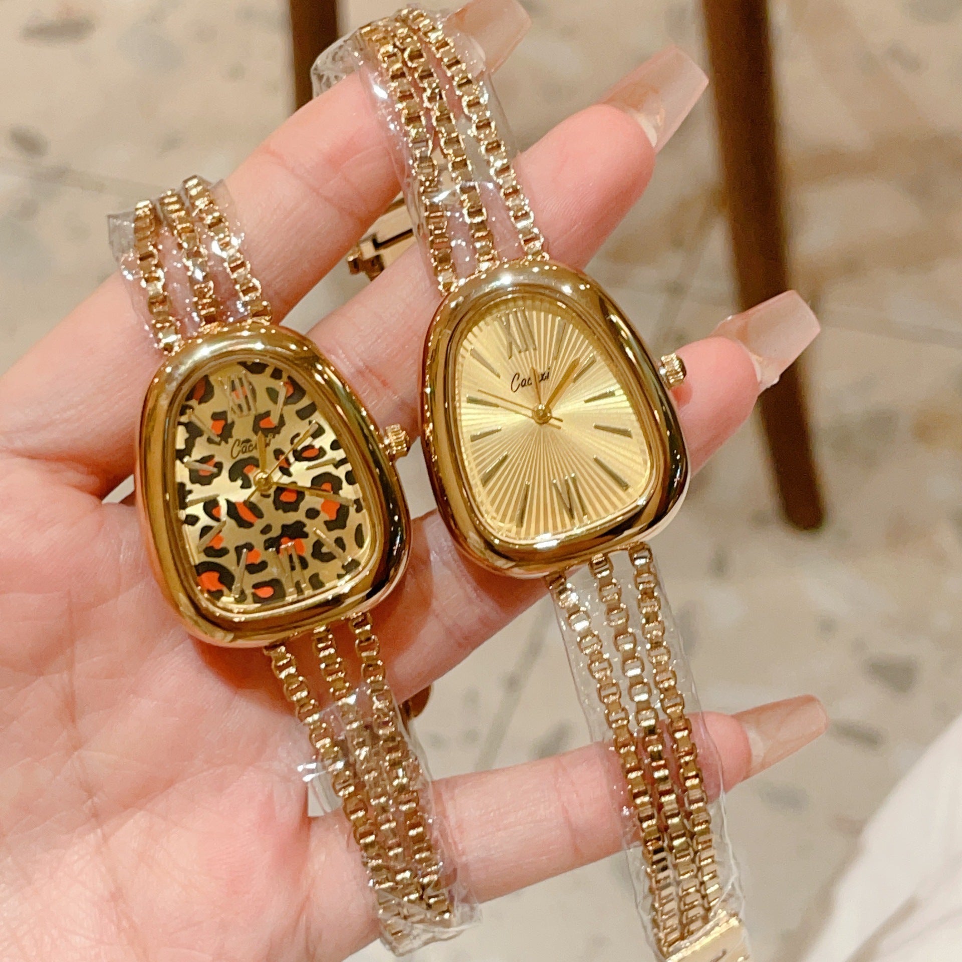 Cacaxinew arrivalfashion medieval watch snake head casual bracelet watch leopard print gold women's watch