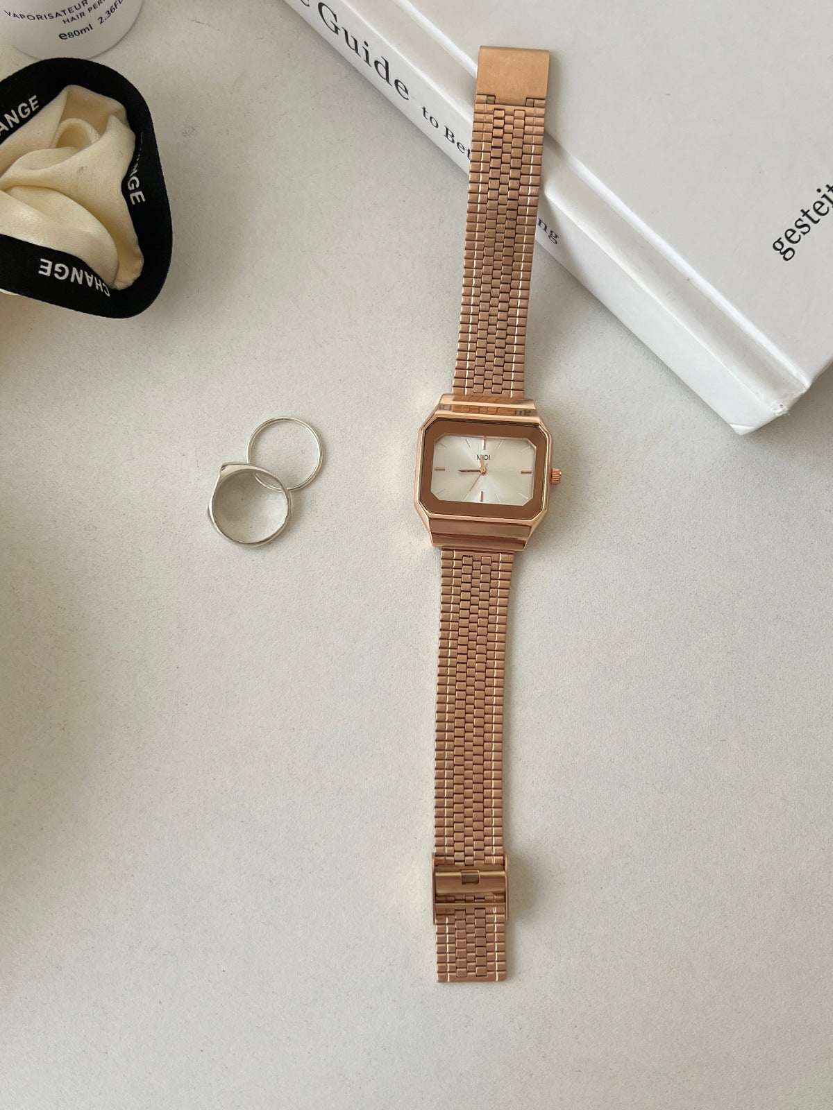 Gold-tone square watch for women - vintage-inspired, understated luxury, exquisite minimalist design